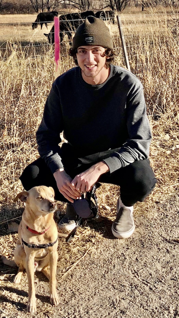 Joshua with his dog, Scooter